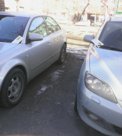 Распространение листовок под дворники автомобилей
