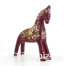 Dark red horse with a peony