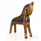 A bay horse in purple and gold attire
