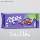 Шоколадная плитка Milka, с цельным фундуком, 100 г